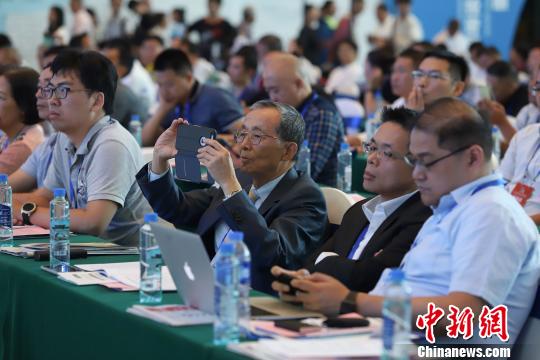 研討會現(xiàn)場圖?！■暮陚?攝